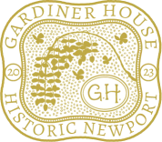 The image shows a gold emblem with "Gardiner House Historic Newport" and "GH" in the center, flanked by "23" on the sides.